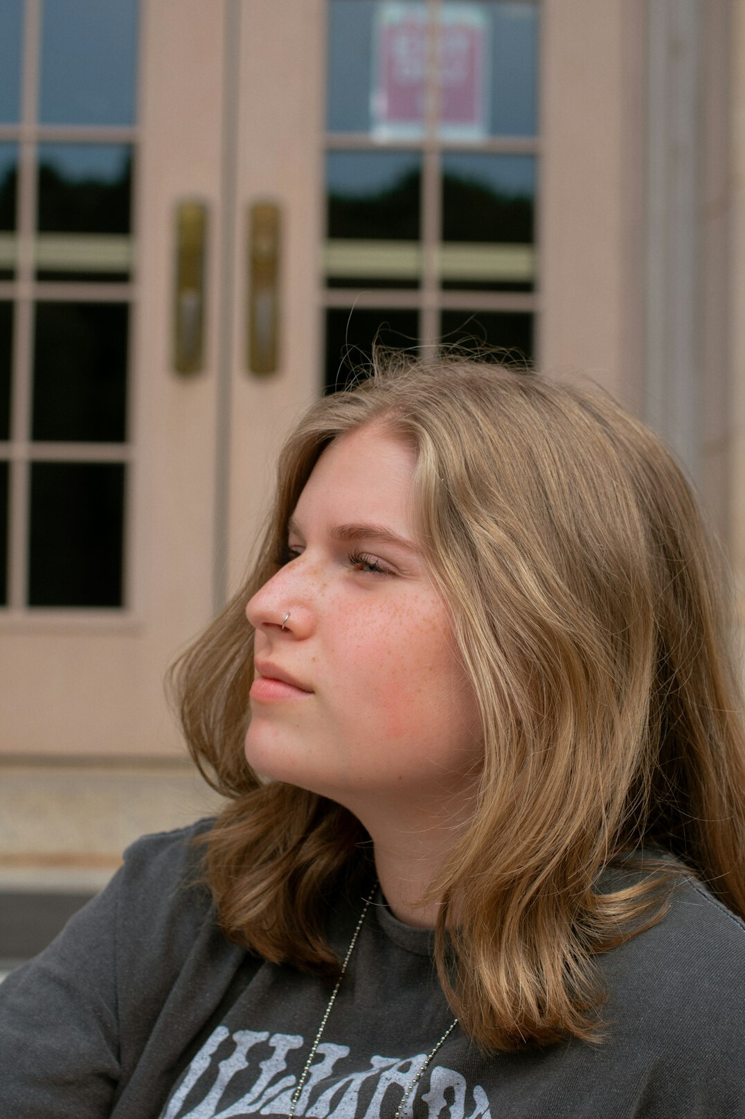Portrait of a young woman with light brown hair